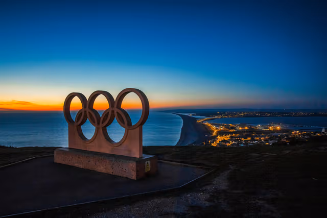 Die Olympia Ringe mit Hintergrund